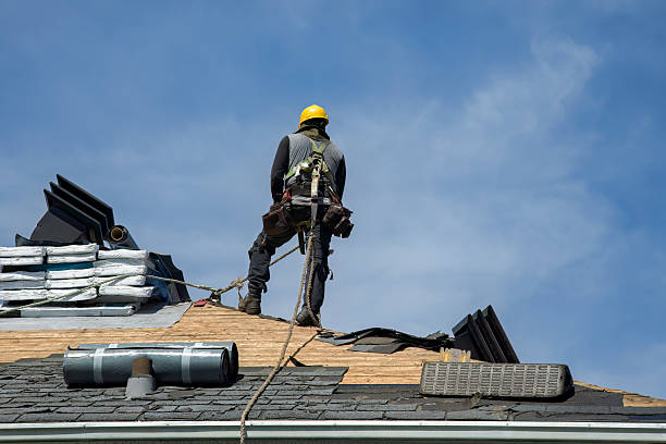 Professional Roofing technician working in Woodburn, IA